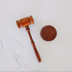 brown wooden smoking pipe on white surface